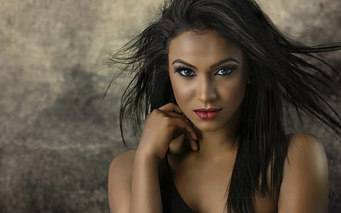 woman wearing black sleeveless top thumbnail