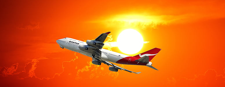 white and red airliner in sky wallpaper thumbnail