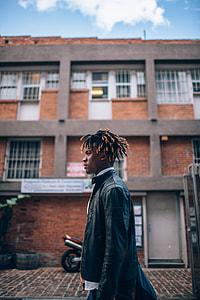 man in black jacket photography thumbnail