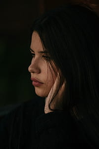 close-up photo of woman with left hand on her cheek thumbnail