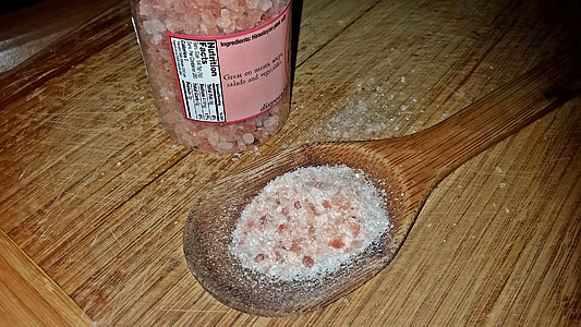 white and beige powder on brown wooden ladle thumbnail
