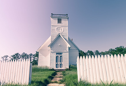 white wooden house under blue sky thumbnail