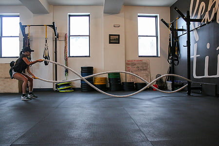 woman performing battle rope exercise thumbnail