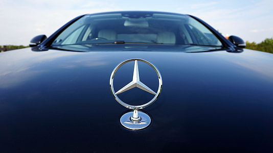 close up photo of Mercedes-Benz car emblem thumbnail