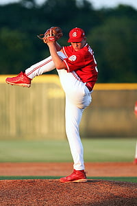 baseball player throwing ball at daytime thumbnail