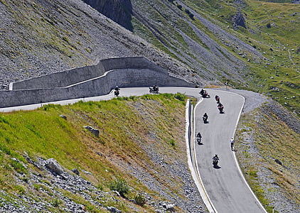 group of people riding motorcycle during daytime thumbnail