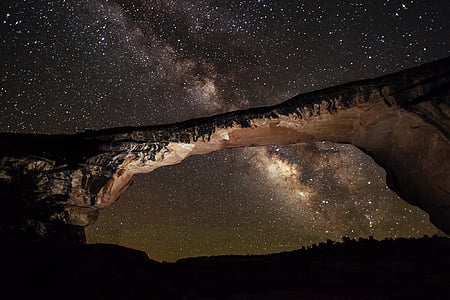 rock formation over starry sky thumbnail