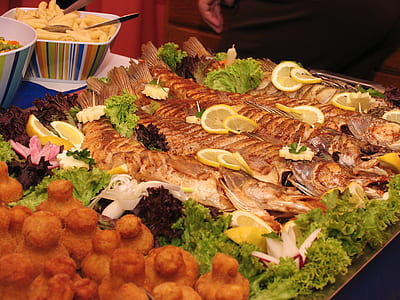 grilled meat with sliced of vegetables and fruits display on table thumbnail