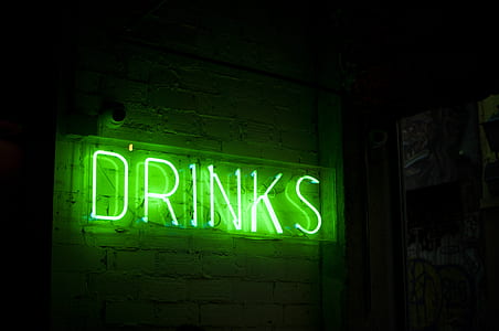 minimalist photography of green drinks neon light signage thumbnail