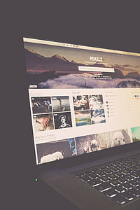 turned-on gray laptop computer thumbnail