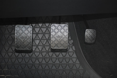 three black vehicle pedals thumbnail