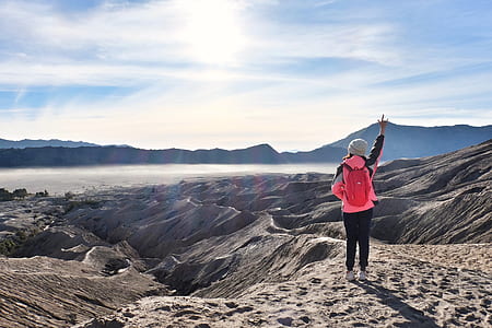 woman standing on top of the mountain thumbnail