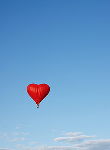 red heart hot air balloon flying on air thumbnail