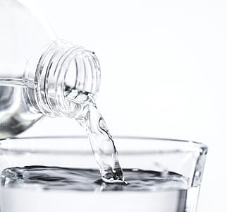 Bottle Pouring Water on Glass thumbnail