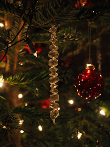 red Christmas bauble on Christmas tree thumbnail