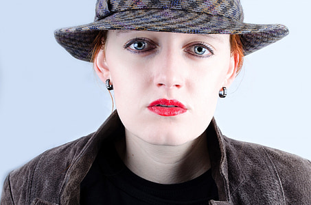 portrait photo of woman in gray hat thumbnail