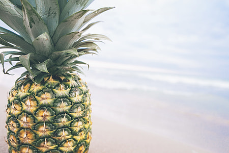 closeup photography of green and yellow pineapple fruit thumbnail