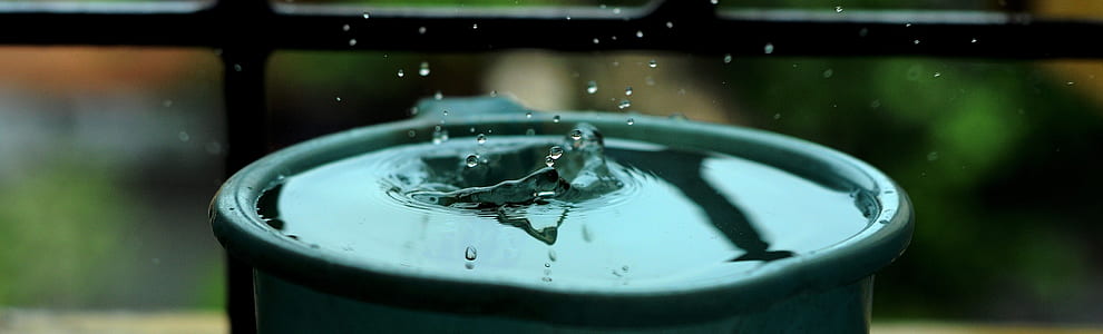 round tin can with rain drops thumbnail