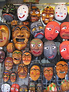 assorted face masks hanging on display rack thumbnail