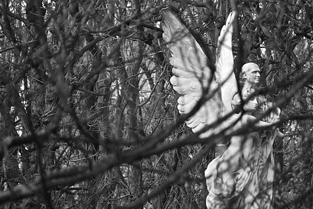 white concrete angel sculpture thumbnail