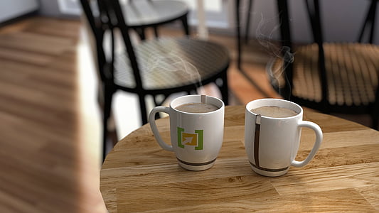 two white mugs on brown table thumbnail