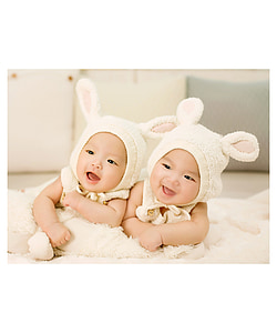 two toddler's with bunny outfits thumbnail