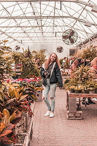 woman inside greenhouse garden thumbnail