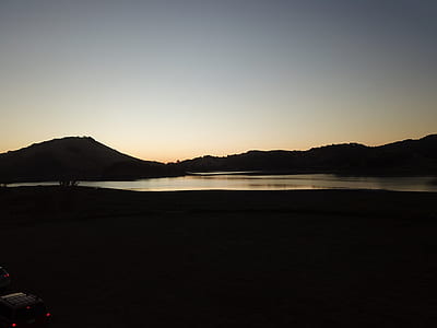 silhouette of hills during daytime thumbnail