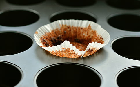cupcake liner on top of grey cupcake mold thumbnail