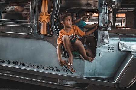 boy riding PUJ thumbnail