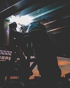 closeup photo of man welding machine thumbnail