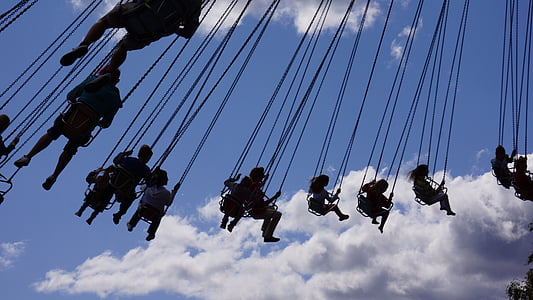 silhouette of people on amusement park thumbnail