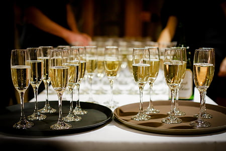clear champagne glasses with champagne inside thumbnail