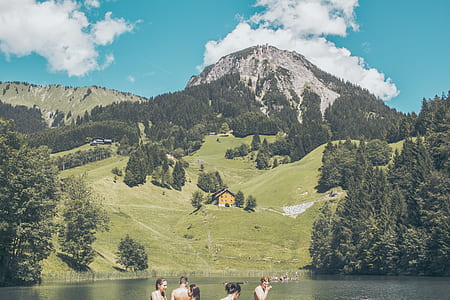 landscape photography of mountain with water at bottoms thumbnail