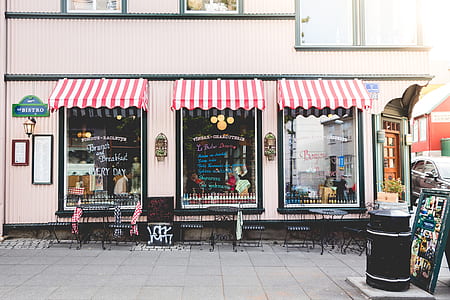 stores with red and white awning thumbnail