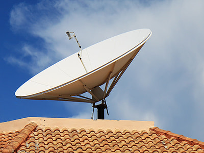 white parabolic dish on brown roof thumbnail
