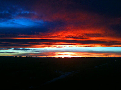 horizon under orange clouds at daytime thumbnail