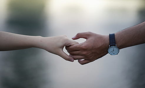 Man and Women Holding Hand thumbnail