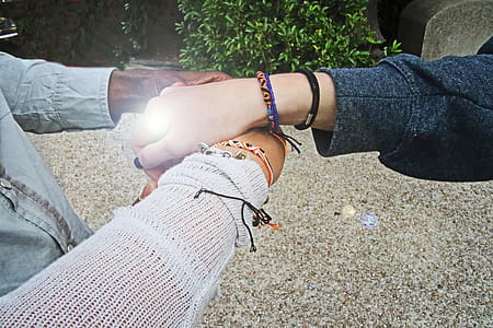 Three People Holding Each Other's Hands thumbnail