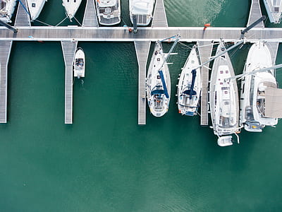 aerial view of white yachts during daytime thumbnail