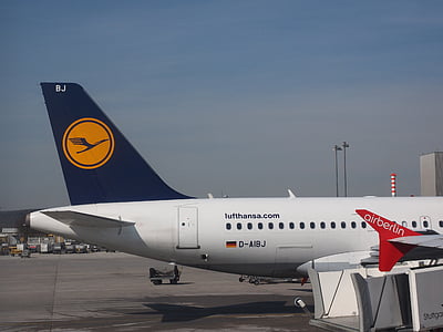 parked white Lufthansa airliner thumbnail