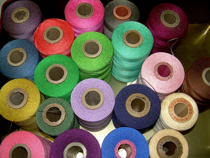 assorted color thread spools