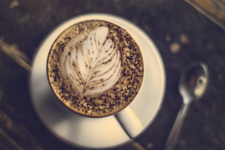 selective focus photo of filled white cup on top of white surface thumbnail