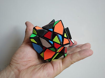 person holding trapeze Rubik's cube thumbnail
