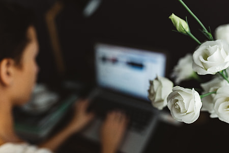 Woman working on laptop at home office thumbnail