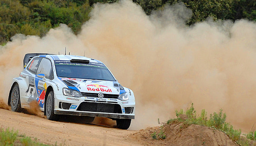 white Volkswagen 3-door hatchback drifting on road during daytime thumbnail