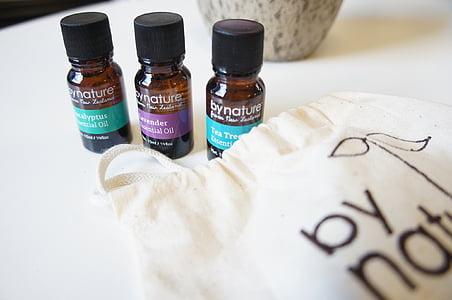 three By Nature bottles near white pouch thumbnail