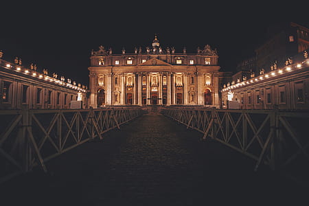 landscape photo of gray building during nightime thumbnail