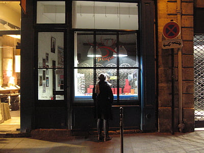 woman standing in front of a store facade thumbnail