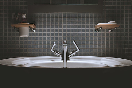 running water from silver faucet thumbnail